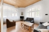 Altbautraum mit Stil – 3-Zimmer-Wohnung mit prachtvoller Deckenhöhe - Wohnzimmer