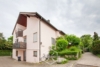 Modernisierte 2,5 Zimmer Wohnung mit Wintergarten - Außenansicht