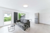 Möblierte 2-Zimmer-Terrassenwohnung - Wohn- und Essbereich