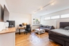 Charmante 1-Zimmer-Wohnung mit Bad & Küche – ideal für Singles - Wohnzimmer