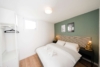 Möblierte 1,5 Zimmer-Wohnung mit Balkon - Schlafzimmer