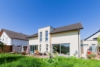 Wohnen ohne Kompromisse – Hochwertiges Traumhaus für Familien mit Stil - Gartenbereich