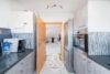 Attraktive 4,5-Zimmer-Dachgeschosswohnung mit Balkon, Garage und großem Garten - Küche