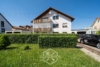 Attraktive 4,5-Zimmer-Dachgeschosswohnung mit Balkon, Garage und großem Garten - Außenansicht