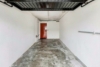 Drei Ebenen Lebensqualität – Modernisiertes Einfamilienhaus im Grünen - Garage - (KI generiert)