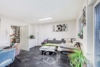 Drei Ebenen Lebensqualität – Modernisiertes Einfamilienhaus im Grünen - EG Wohnzimmer