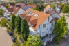 Wohngefühl auf zwei Ebenen – lichtdurchflutete Maisonette mit Balkon - Außenansicht