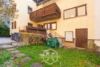 Wohnen auf zwei Ebenen – Gartenidylle trifft modernen Komfort - Garten