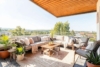 Ein Logenplatz über den Dächern – Penthouse mit Dachterrasse - Einrichtungsbeispiel KI generiert